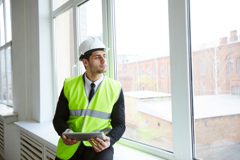 A businessman on a construction site